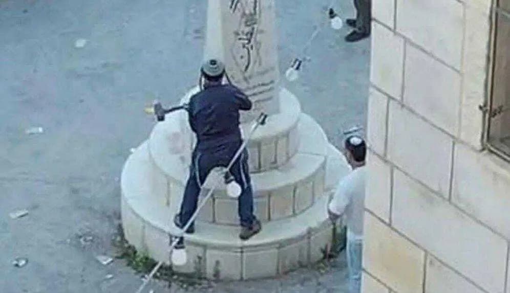 Knesset member destroys West Bank monument