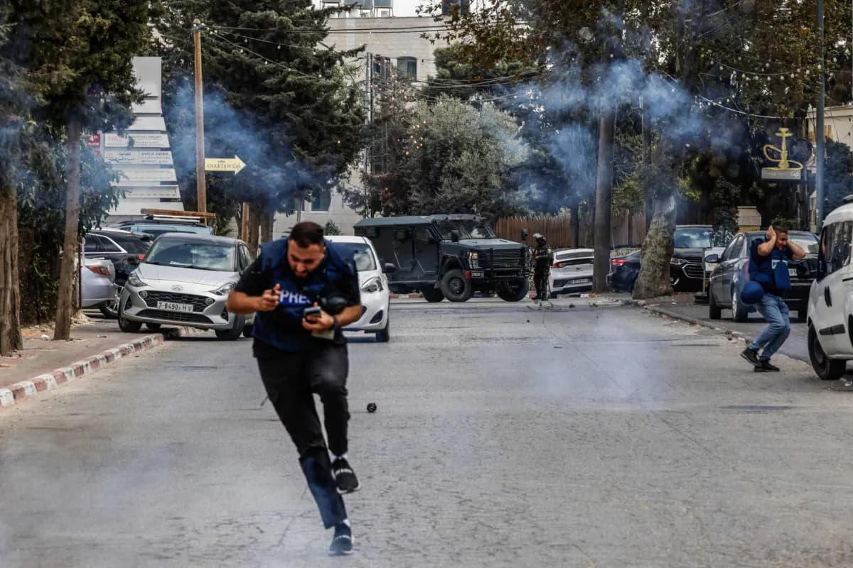 Israeli troops raid Ramallah, target NGOs