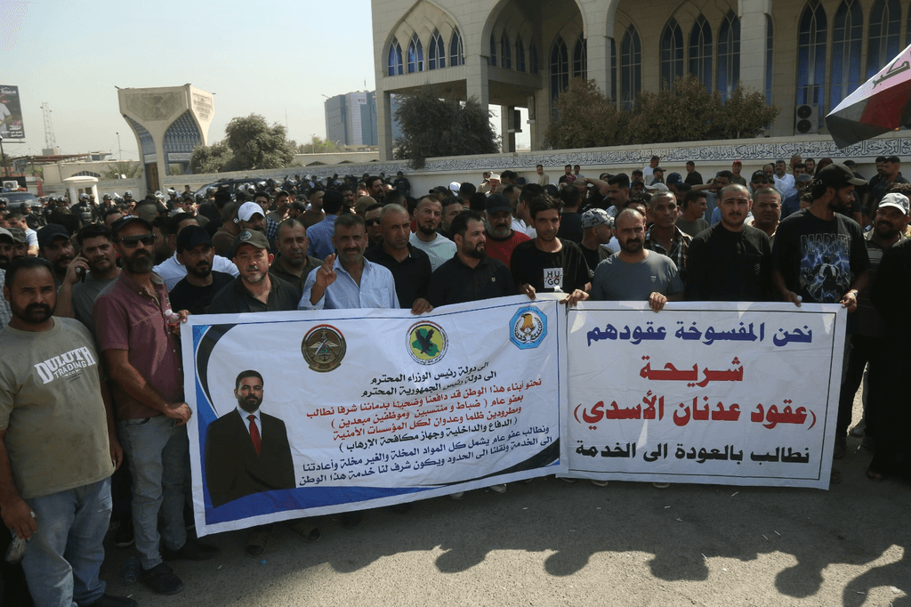 Ex-members protest after contract termination in Al-Awza’i