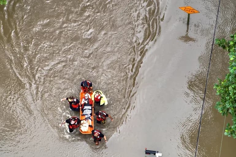 Violent weather across US causes deaths and Hawaii storm threat