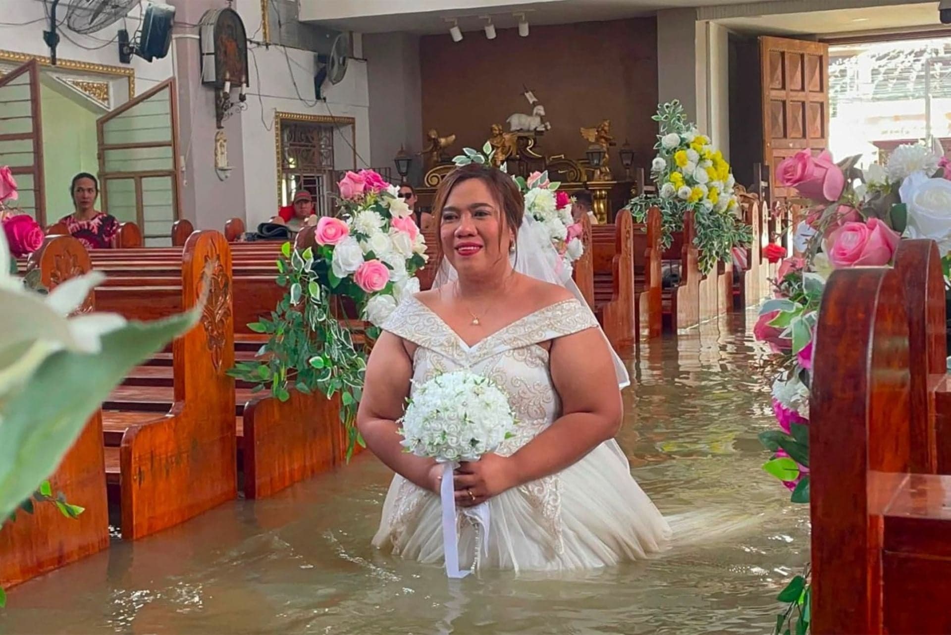 Unusual wedding captured in floodwaters