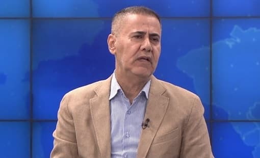 Al-Qassab Warns Government on Iran Meetings