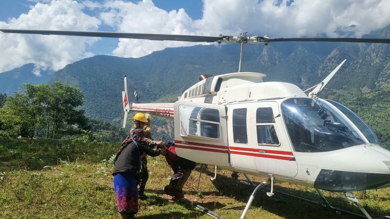 Helicopters search flood-affected Nepal villages
