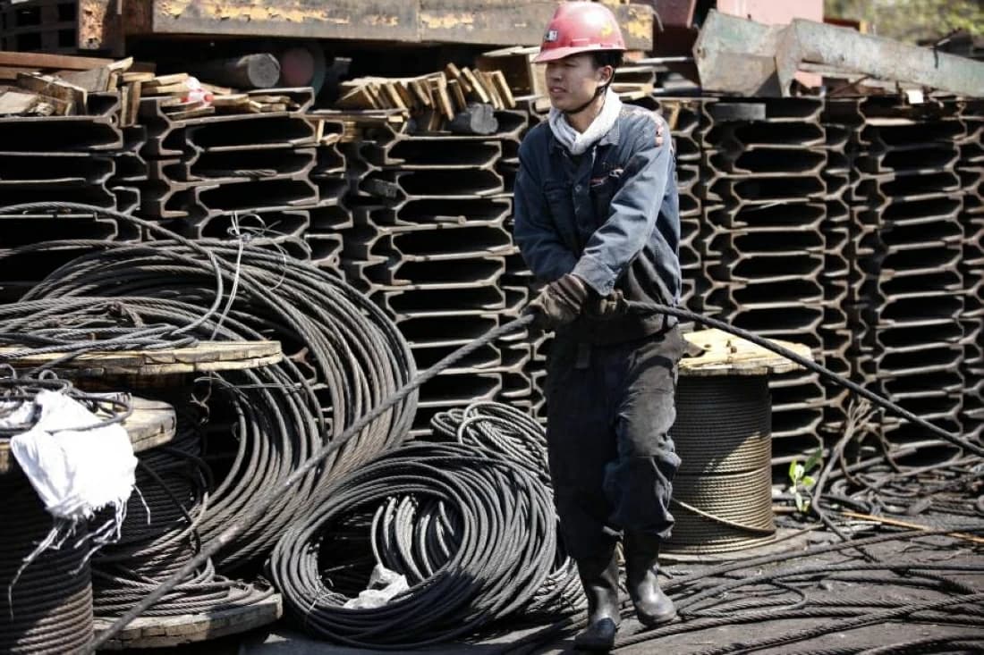Iron ore falls to 13-month low