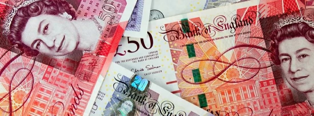 Pound hits six-month high versus dollar