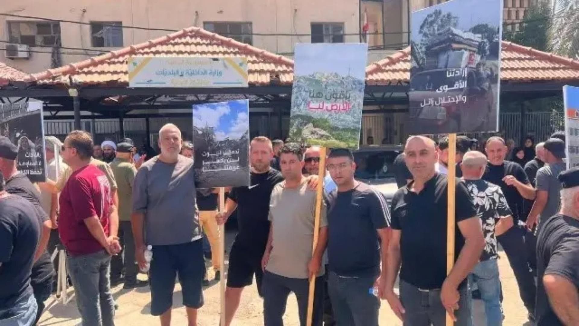 Protest Demands Village Return Plan