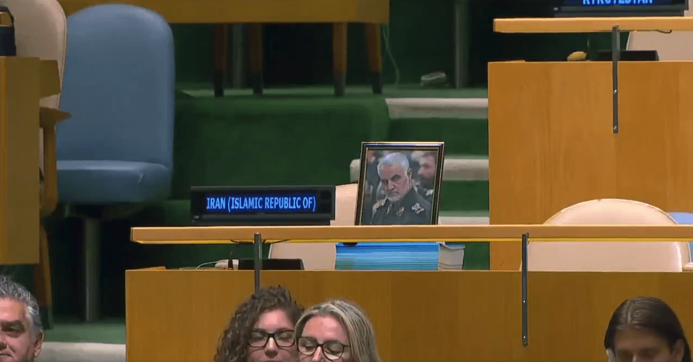 Iranian delegation leaves Soleimani image before withdrawal