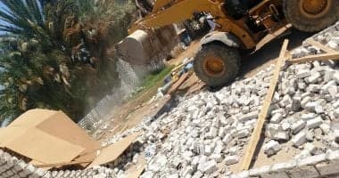 حملة لإزالة 202 تعد على أراضي الدولة بأسوان