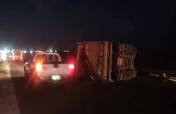 Vehicle collision blocks desert road