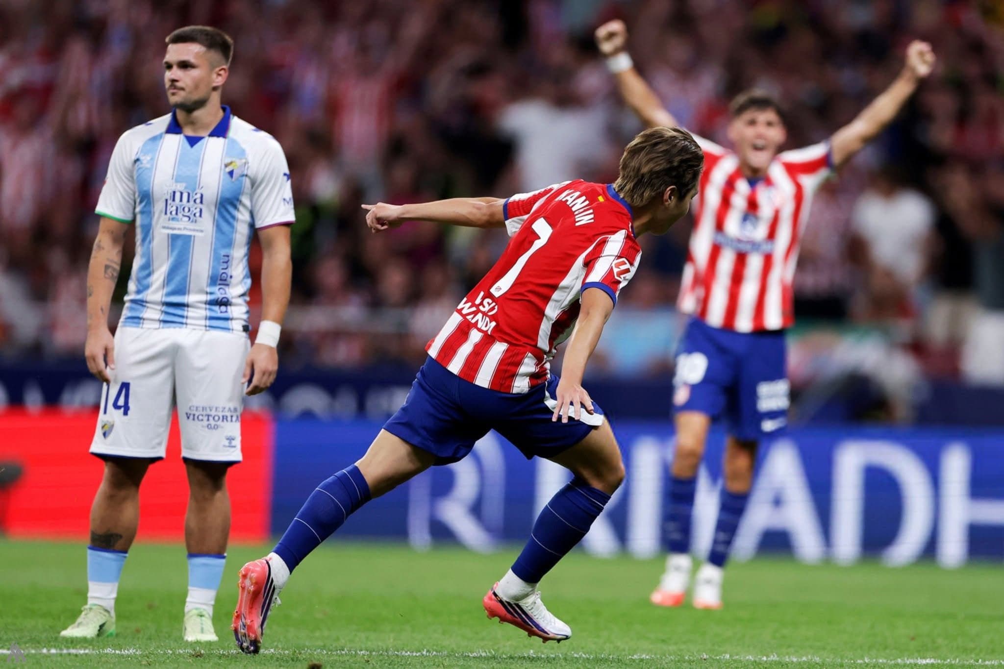 Atlético Madrid opens La Liga with narrow win over Malaga