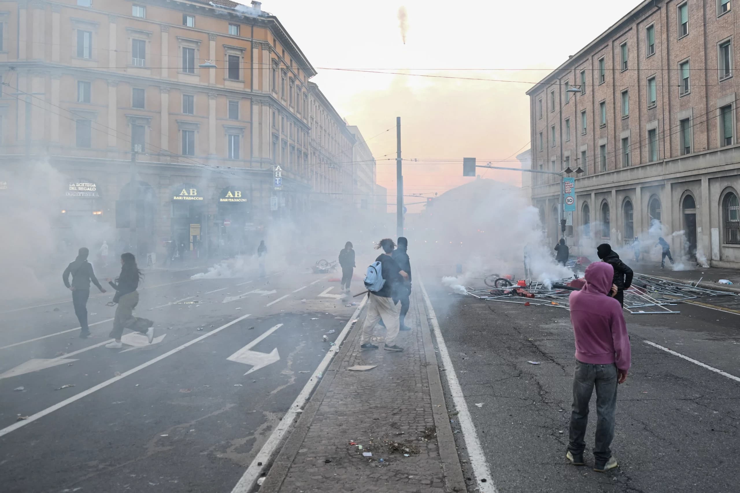 Police and protesters clash in Milan and Bologna over rising living costs
