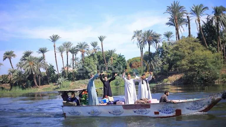 موكب نيلي يحمل جهاز عروس بأسيوط