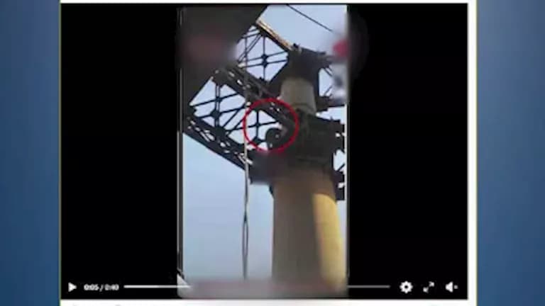 حقيقة فيديو استقرار أشخاص فوق لافتة في قصر النيل