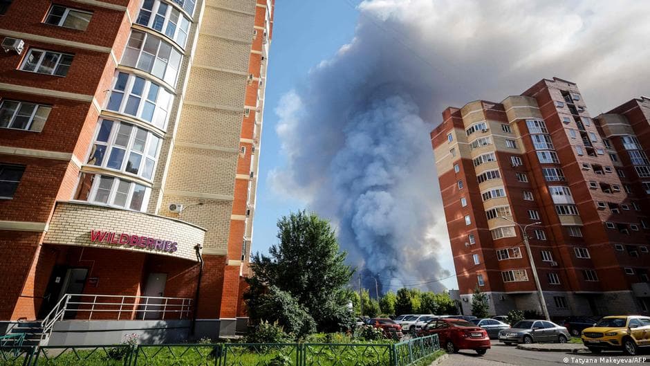 Rocket attack hits Kyiv and Russian oil fires
