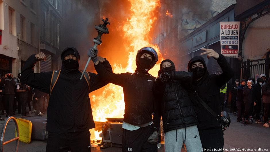 France suspends protests after violence Macron blames far-left