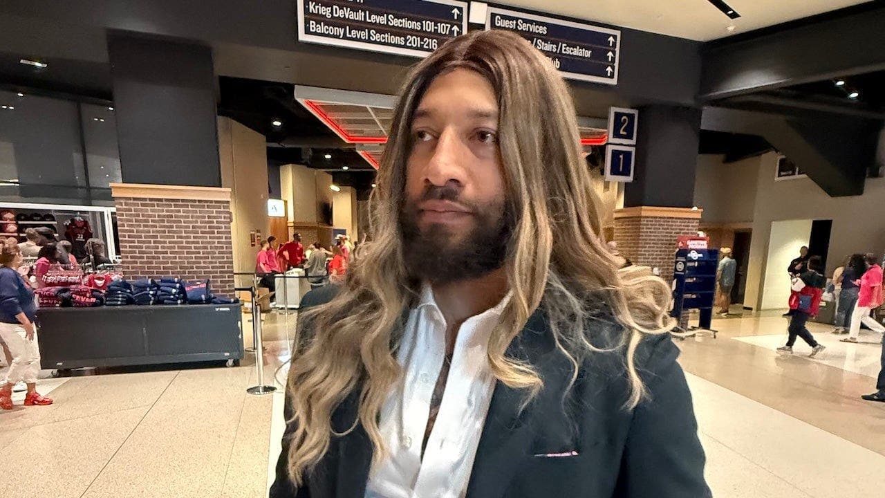 Royce White attends Fever game with blonde wig