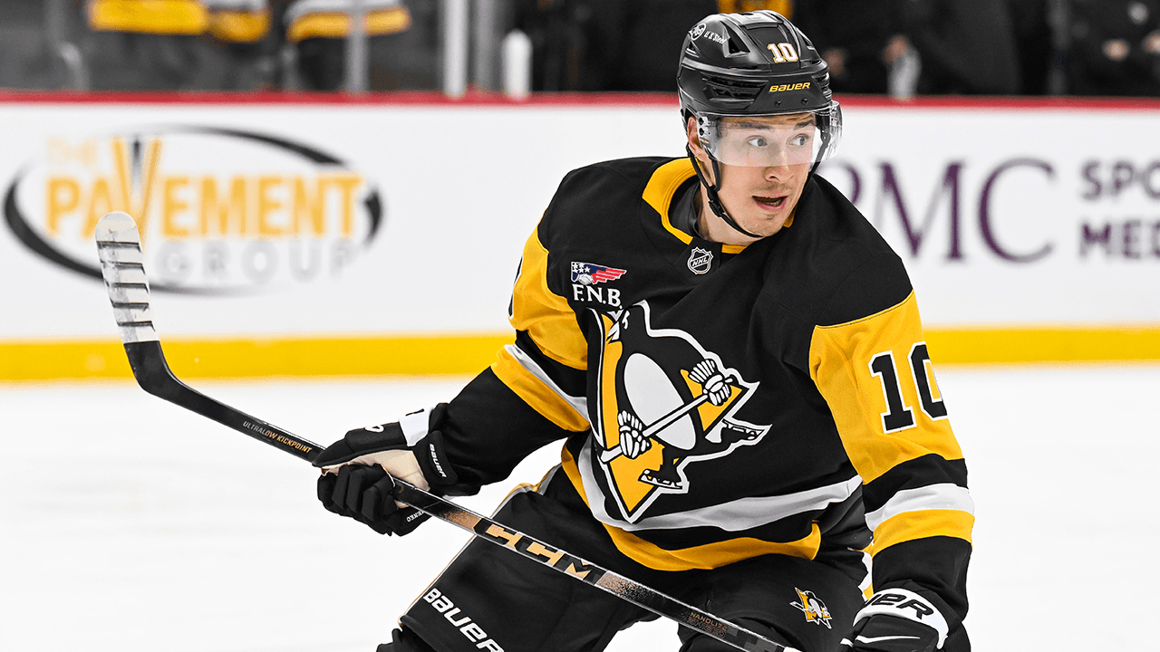 Kuzmenko honors father with jersey change
