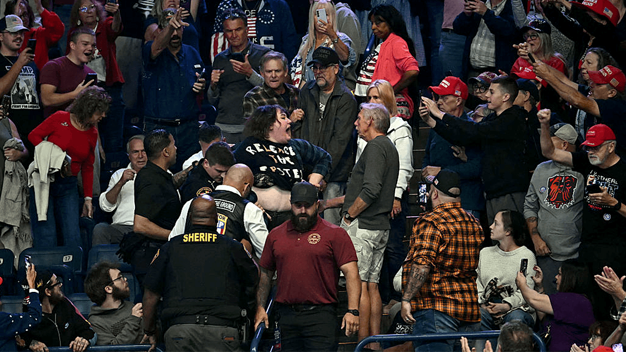 Trump supporter punches protester at Ohio rally