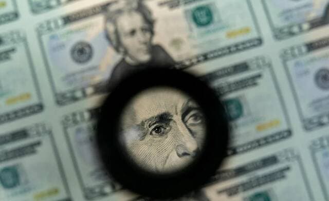 Dollar up, yen down after BoJ rate hold