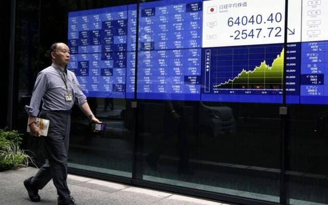 Asian stocks climb on easing tensions