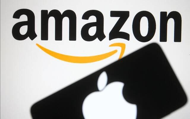 Amazon rises as Apple falls amid earnings forecasts