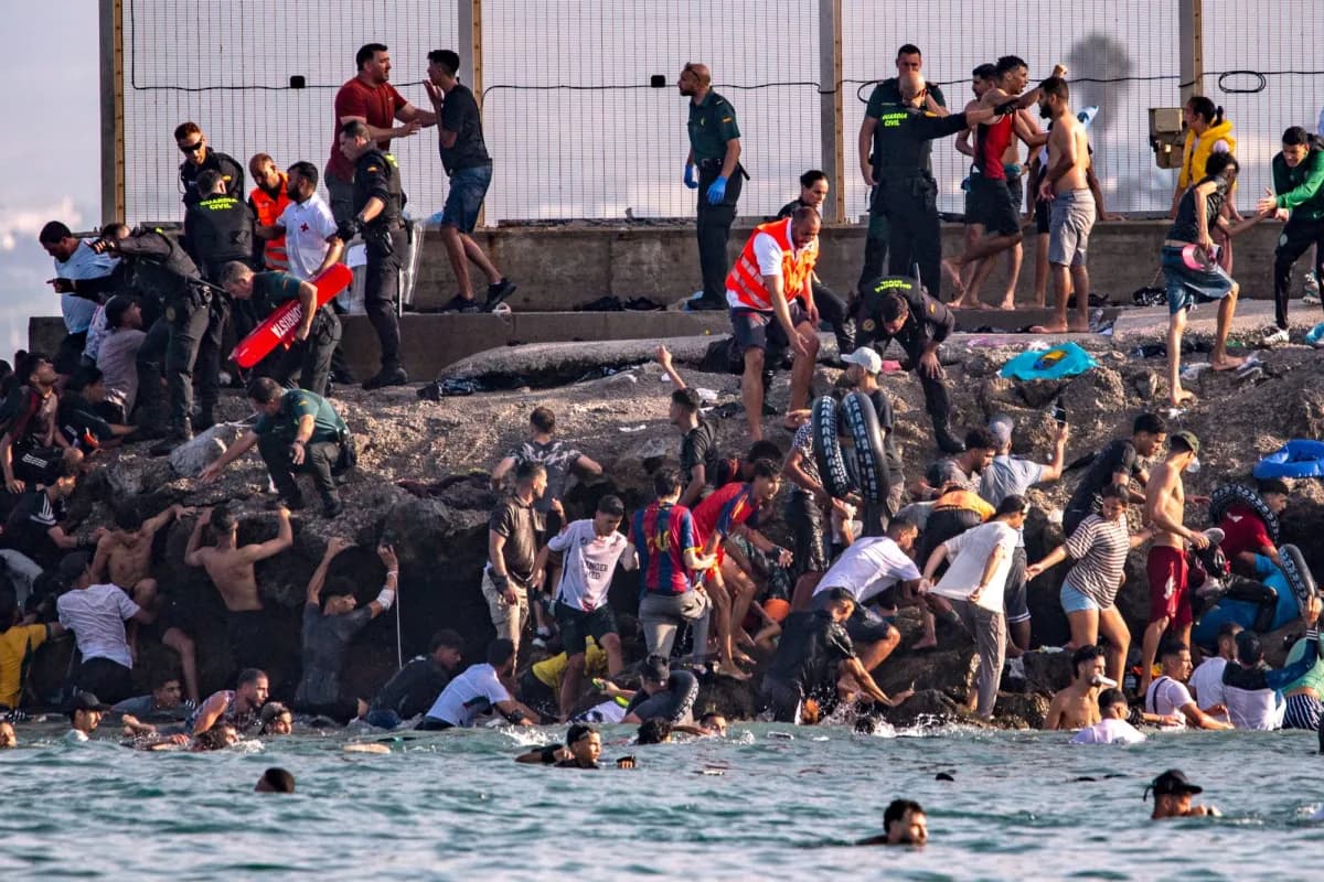 Spain deploys army as migrants surge into Ceuta