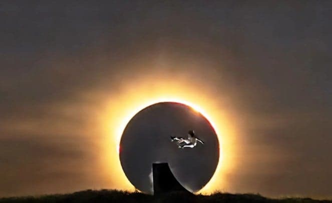 Skier Records Solar Eclipse Scene