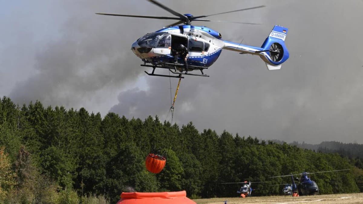 Helicopters resume fire suppression in Germany