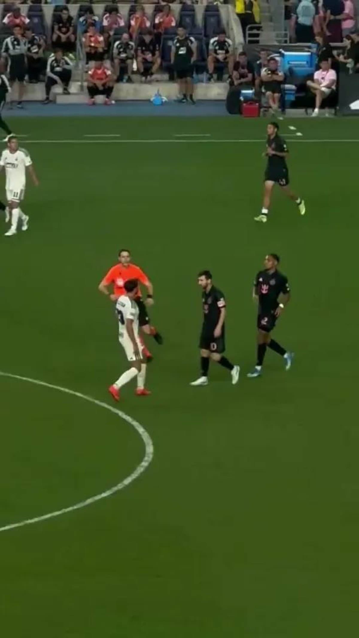 Messi avoids red card after slap