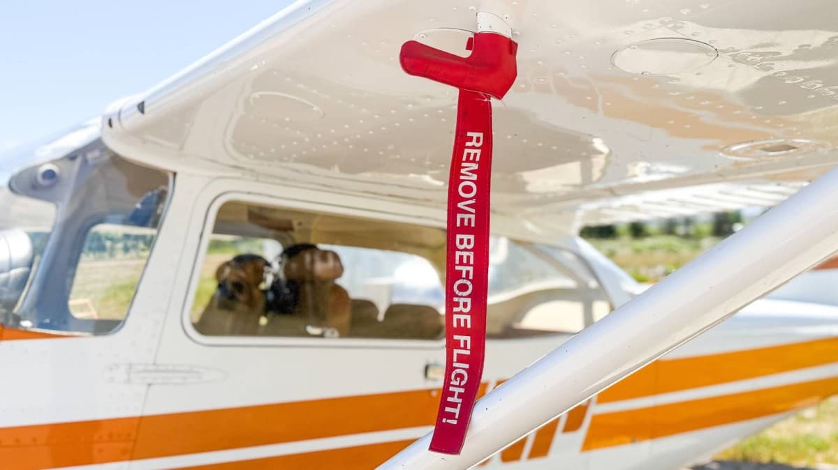 Remove red strips before flight