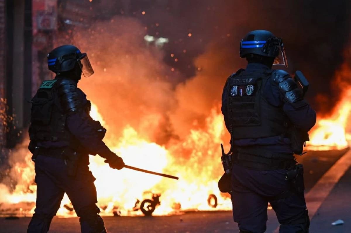 France imposes partial curfew
