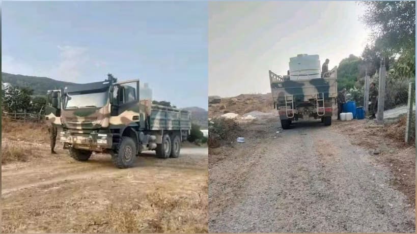 Army and guards supply Dameous Dean with water