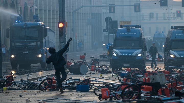 Italian police confront protesters