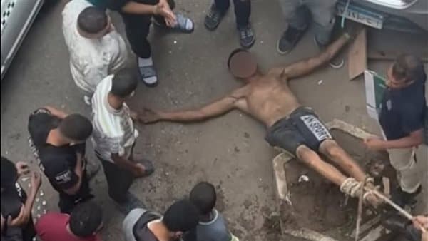 تقييد وضرب شخص أمام مستشفى المهندسين