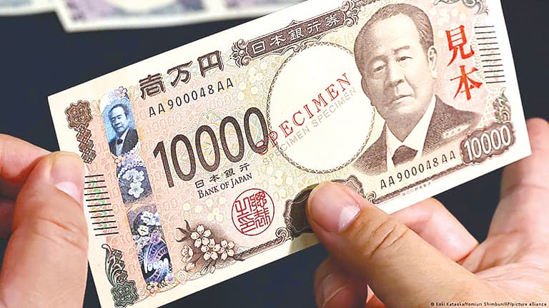 Japan maintains warning as yen hits 1986 low