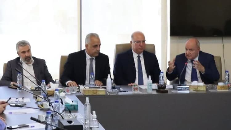 وليد عليق يهنئ الاسمر بفوزه برئاسة الضمان الاجتماعي