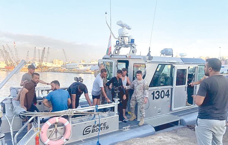 21 migrants rescued and handed to Syria