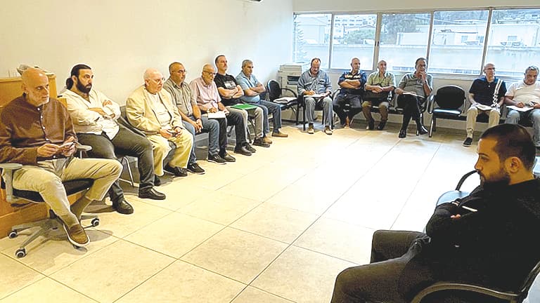 Designer reviews winter prep with contractors