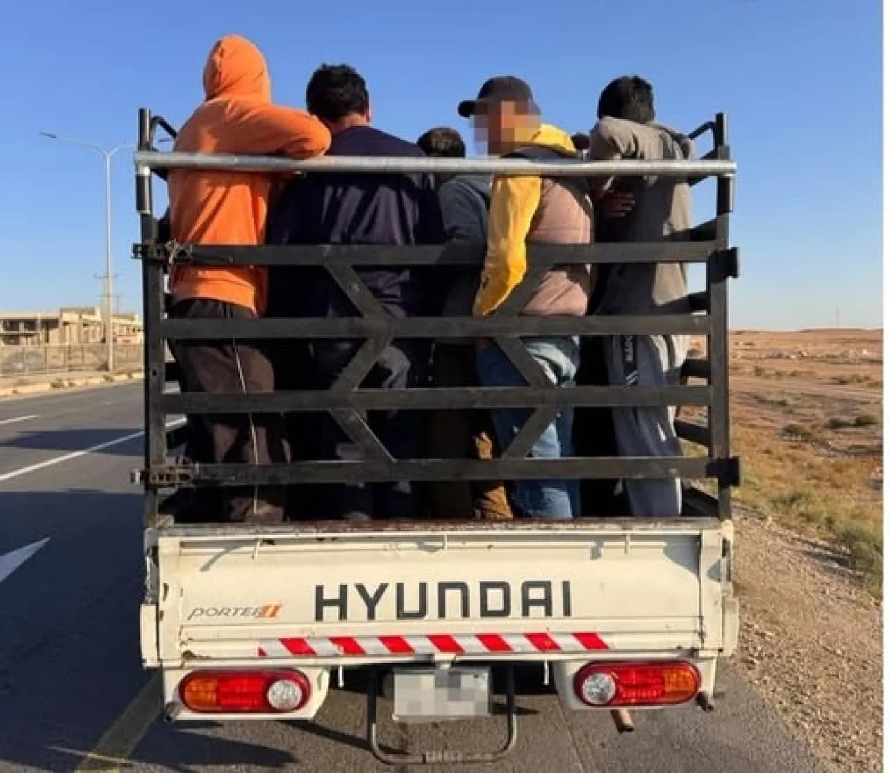 External patrols stop vehicle with trunk passengers