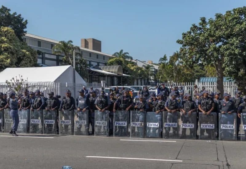South African police seek gunmen after 17 killed at bar