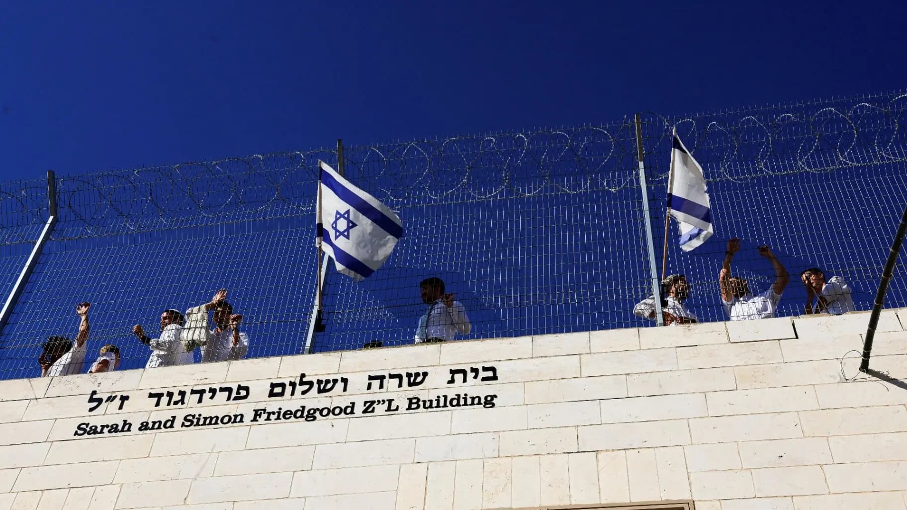 Organizations urge France to ban settlement work