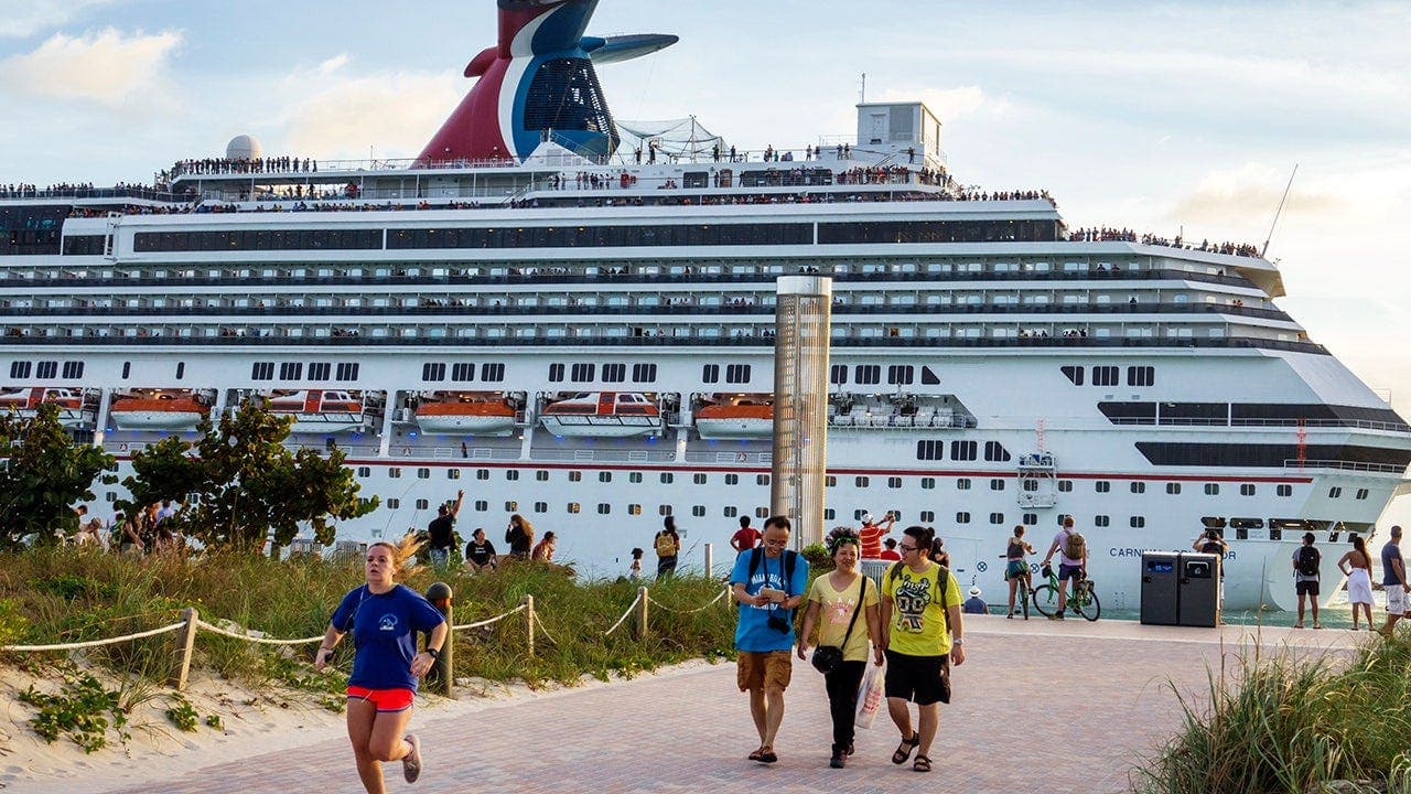 Cruise passenger scratches foot with fork at restaurant